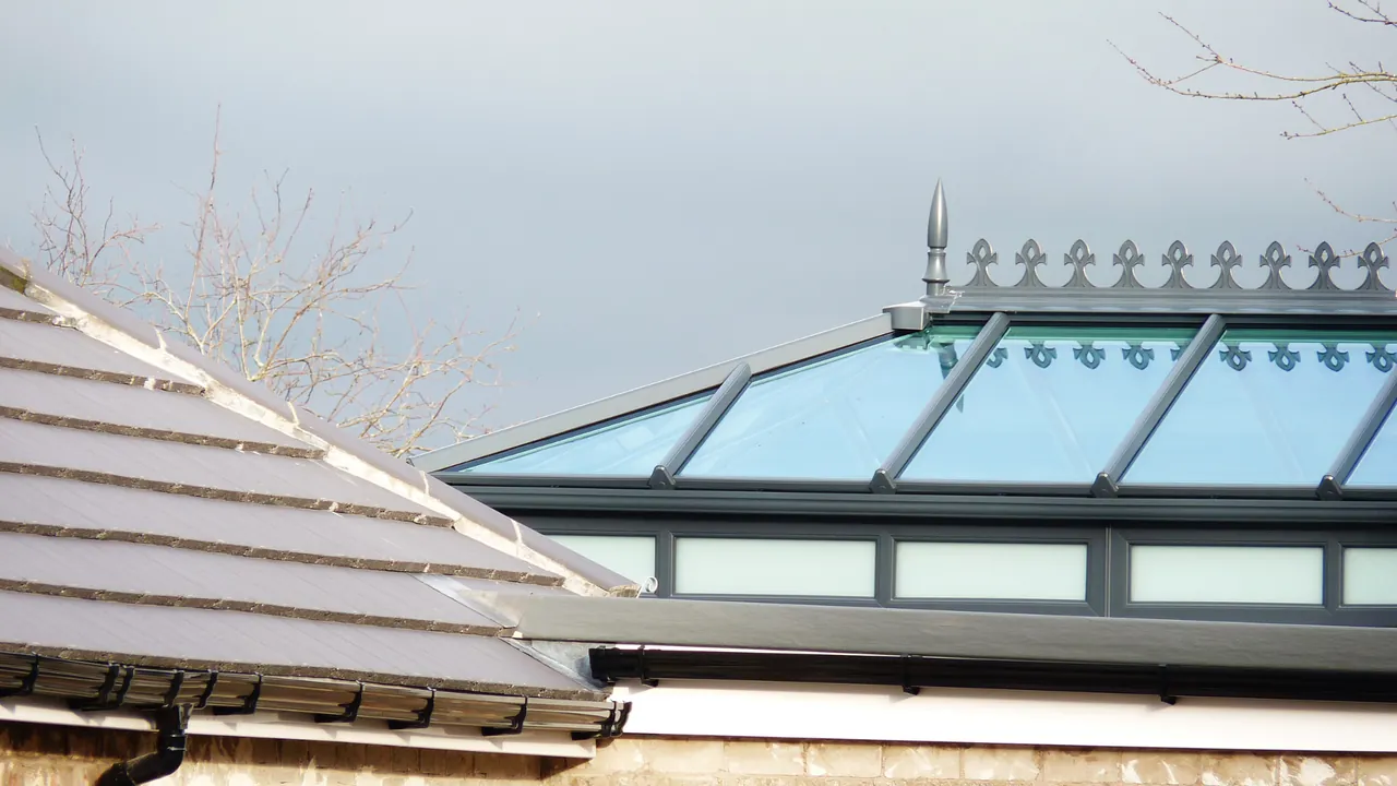Glazed conservatory roof with lantern ridge