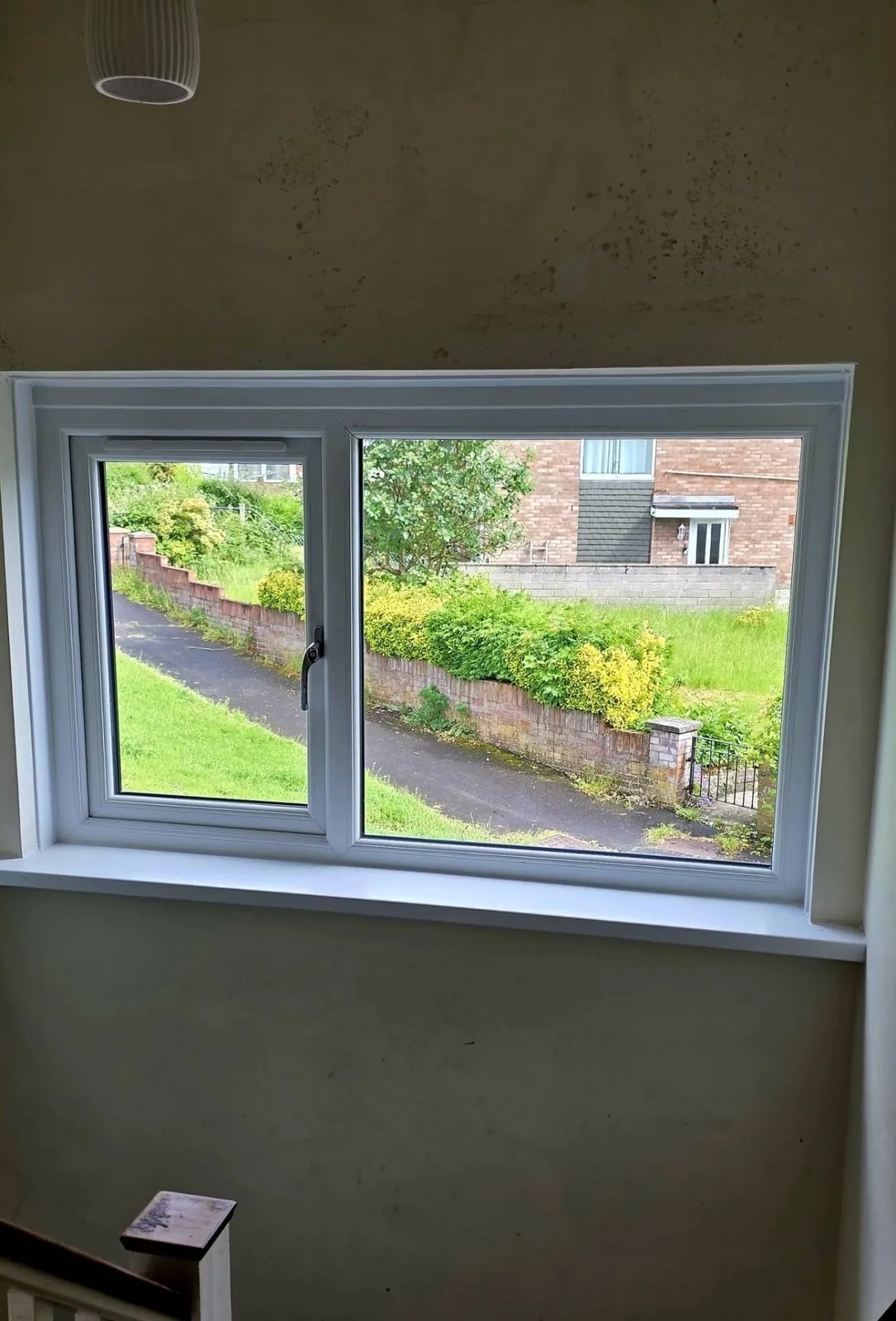 White uPVC two-pane window, interior view