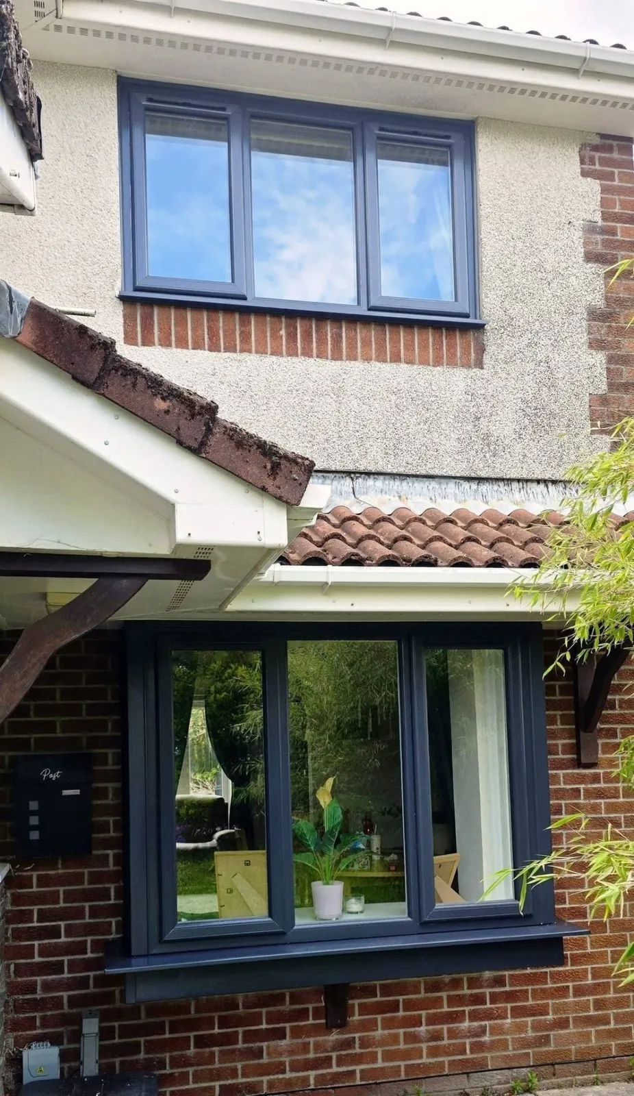 New anthracite bay window and upstairs window on a South Wales home