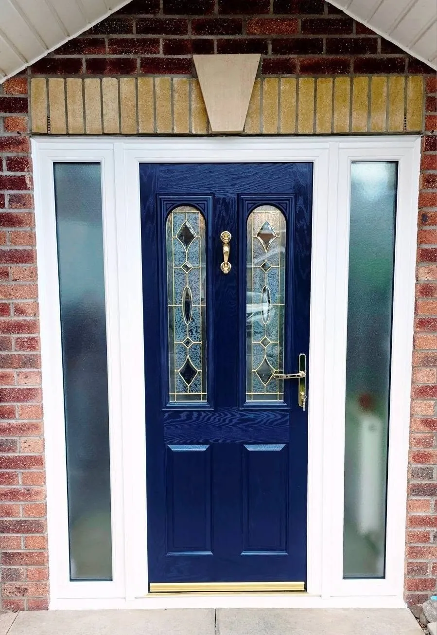 Navy blue composite front door with leaded glass and white side screens